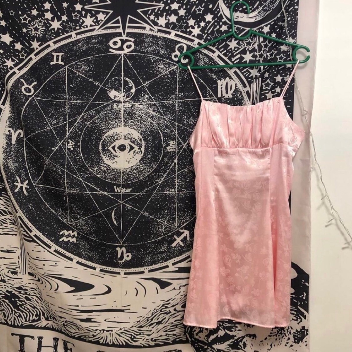 Delicate pink dress with flowers 